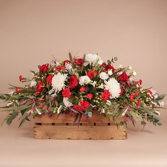 Red and white funeral spray