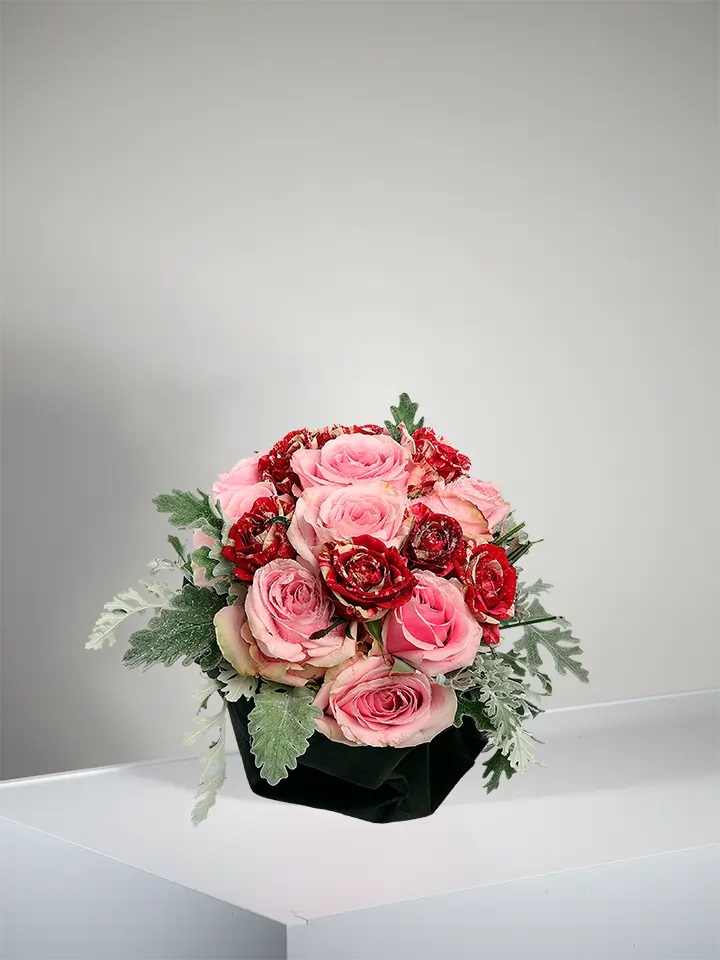 Elegant Centerpiece of red and pink roses